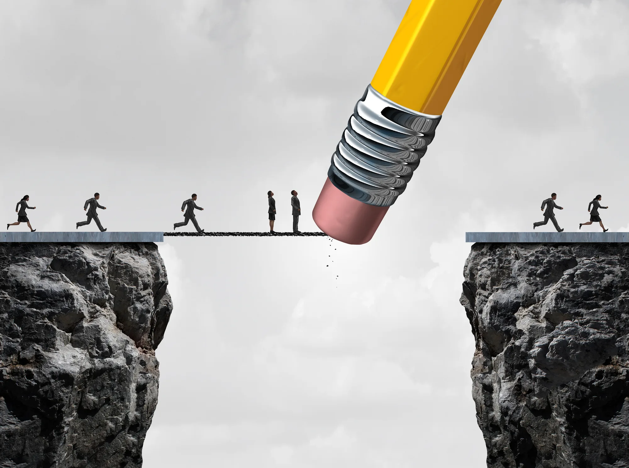 Pencil eraser removing part of a bridge as workers cross it